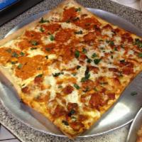 Grandma ala Vodka Pizza · Thin crust pizza with fresh mozzarella, vodka sauce, and basil.