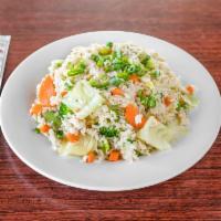 13. Japanese Fried Rice · With green peas, carrots, onions, scallions, and egg.