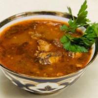 6. Kharcho Soup · Traditional soup: served with rice, lamb, and vegetables.