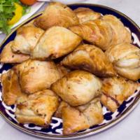 2. Samsa · Chopped beef, iamb, and onions in a crispy pastry.