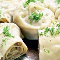 5. Hanum · Chopped lamb, potatoes, and onions wrapped and steamed in thin dough.