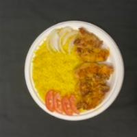 Chicken Kabob Plate · Marinated chicken breast charbroiled, served with rice, pita bread, tomatoes. onions, and tz...