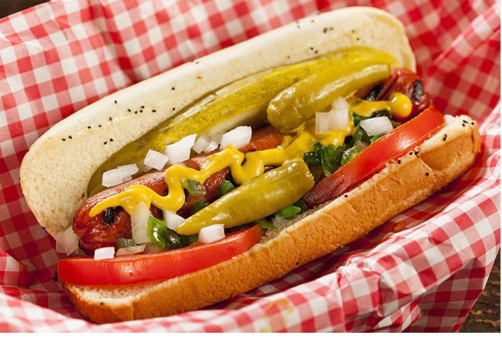 Chicago Hot Dog · Vienna beef hot dog, mustard, relish, onions, tomatoes, pickle, sport peppers, and celery salt.