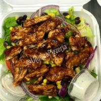BBQ Chicken Salad · Romaine lettuce, chicken breast, bell peppers, onions, tomatoes, corn and black beans with r...