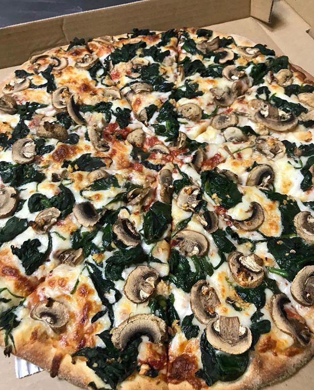 4. Di Spinachi Pizza · Tomato sauce, mozzarella, mushroom, spinach and garlic.