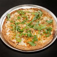 White Out Pizza · White sauce, mozzarella, feta, grilled chicken, garlic, and arugula.