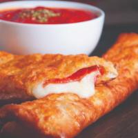 Pepperoni Stick · Pepperoni and mozzarella cheese in a crispy crust topped with garlic butter and cheddar jack...