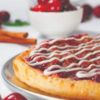 Cherry Pie · Apple topping, caramel, cinnamon streusel and vanilla icing on a pan crust.