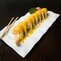 S15. Mango Special Roll · Crispy shrimp and avocado topping with lobster salad, sliced mango and mango sauce.