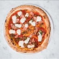 Meats Pizza · Italian tomato sauce, fresh mozzarella, meatballs, pepperoni, rosemary ham and basil.
