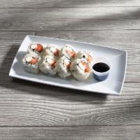 Philadelphia Roll · Cream cheese, avocado and salmon wrapped with sushi rice.