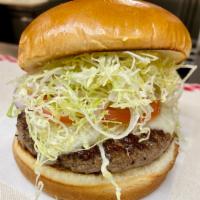 All American Buger · 8 oz. beef patty with white American, lettuce, tomato, onion and pickles.