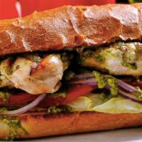 Pesto Chicken Sandwich · Pesto chicken sandwich served on a soft and baked French roll. Served with mayonnaise, musta...