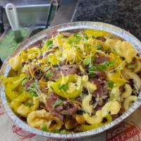 MacRami Fries · Fries topped with Mac N Cheese - Heavenly Cut Pastrami - Grilled Onion - Sliced Yellow Peppe...