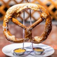 Soft and Salty Jumbo Pretzel · Comes with spicy ale mustard. Add beer cheese for an extra charge.