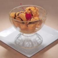 Lucuma Ice Cream · 2 scoops of ice cream made from an exotic Andean tropical fruit high in vitamin B3 and carot...