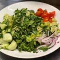 Garden Salad · Mixed greens, tomato, cucumber, red onion, house tomato vinaigrette