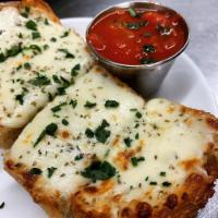 Cheesy Garlic Toast · Herb garlic butter, San Marzano marinara
