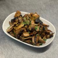 Pan-Roasted Mushrooms · Sherry, butter, thyme