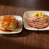 Country Breakfast · 3 extra-large eggs, 3 buttermilk pancakes, 3 bacon strips or 3 sausage links or ham steak. 