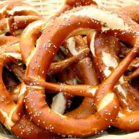 Big A*# Pretzel · Giant Bavarian Pretzel served with House Made Beer Cheese, Cheddar Cheese, and Stone Ground ...