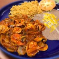 2. Camarones a la Diabla · Shrimp, mushrooms and onions sauteed in butter and flavorful spices.