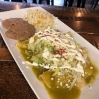 Enchiladas · Three chicken or cheese enchiladas served with rice and beans and your choice of toppings.