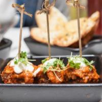 Tuscan Chopped Meatball · chopped house-made pork and beef meatball with red pepper tomato sauce, whipped goat cheese ...