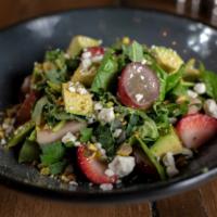 Harvest Kale Salad · spinach, kale, strawberries, pistachio dust, goat cheese, grapes, avocado, and honey balsami...