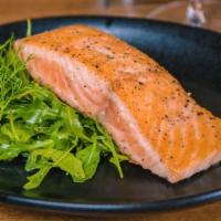Salmon · 8 oz. pan-seared & served with lemon herb butter and a petite arugula salad
