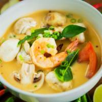 TOM KHA DINNER · Spicy soup with coconut milk, mushrooms, tomatoes, cilantro, lemongrass, galangal roots and ...
