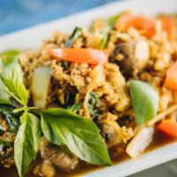 THAI SPICY BASIL DINNER · Minced chicken stir fried with bell peppers, onions, sweet basil, mushroom and bamboo shoots.