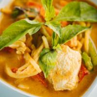 RED CURRY DINNER · Basil, peas, bell peppers and bamboo shoots.