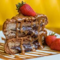 French Press · Stuffed and pressed French toast with hazelnut ganache then battered and deep-fried topped w...