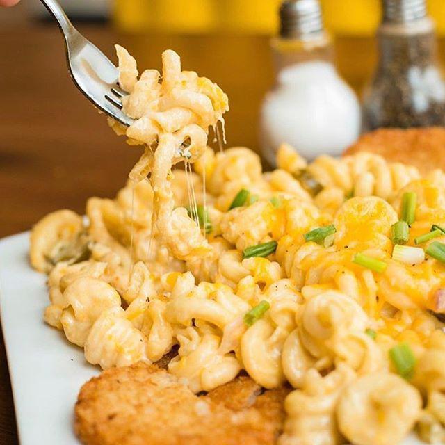 Breakfast Mac and Cheese · Pasta tossed with cheese sauce, jalapeno and onions over crispy hash browns topped with melted cheddar cheese. Vegetarian.