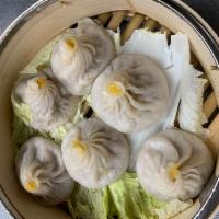 Xiao Long Bao · Hand made soup dumplings with pork, mixed vegetables and crabmeat.