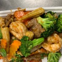 S15. Four Seasonal Delight · Shrimp, beef, chicken and pork with mixed vegetables in brown sauce.