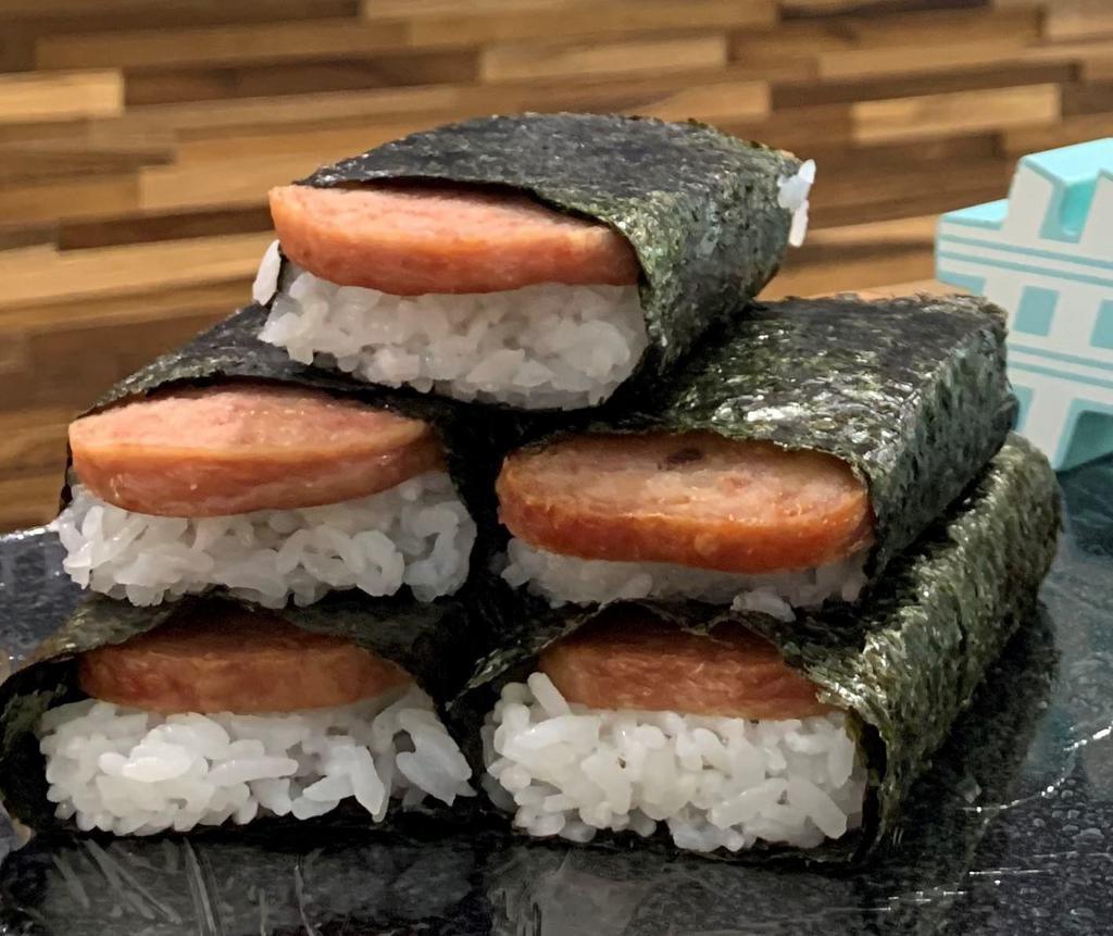 2 Spam Musubi · Marinated spam pan-fried and wrapped with sushi rice in a seaweed wrapper.