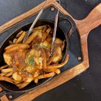 Poutine · House cut fries, cheese curds & house made gravy