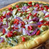 Pesto Chicken Flatbread · Parmesan, roasted peppers, spinach, caramelized onions & pesto