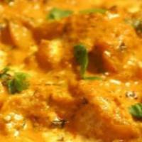 Chicken Shahi Korma · Lightly spiced chicken cooked in creamy sauce. Served with rice.
