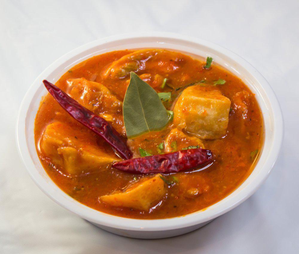 Chicken Vindaloo · Chicken and potatoes cooked in spicy vinegar sauce. Served with rice. 