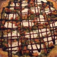Brushetta Pizza · Pesto base (contains pine nuts), seasoned diced tomatoes, basil leaves, fresh mozzarella top...