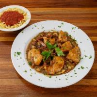 Chicken Marsala · Mushrooms, prosciutto, sweet marsala wine reduction tossed with linguine