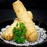 Egg Rolls · Deep-fried chicken and vegetables, soy-based sauce. 2 pieces.