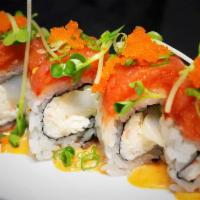 Firecracker Roll · 8 pieces. Scallops, crab, cucumber topped with spicy tuna, fish roe, green onion, sprouts, a...