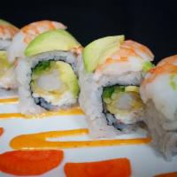Tiger Roll · 8 pieces. Shrimp tempura, crab, avocado, cucumber topped with shrimp, avocado, and 3 sauces.