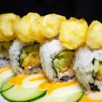 Scallop Tempura Roll · 8 pieces. Scallop tempura, crab, avocado, cucumber topped with scallop tempura, and 3 sauces.