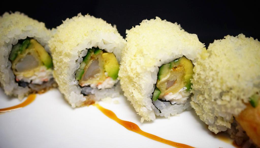 Crunch Roll · 8 pieces. Shrimp tempura, crab, cucumber, avocado topped with tempura flakes, and sweet eel sauce.