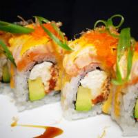 Volcano Roll · 8 pieces. Spicy tuna, crab, avocado topped with salmon, green onion, dry fish flakes, fresh ...
